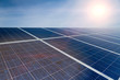 Green Energy - Solar panels with blue sky