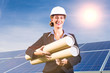 Foto: Solar panels with blue sky, architect in front Solar panels with blue sky, architect in front