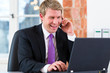 Lawyer in office sitting on the computer