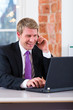 Photo: Lawyer in office sitting on the computer Lawyer in office sitting on the computer