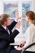 Young lawyer, insurance agent or attorney with client