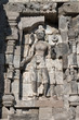 Female deity on relief carving in buddhist temple, Indonesia