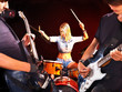 Photo: Woman playing guitar. Woman playing guitar.