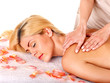 Photo: Woman getting facial massage . Woman getting facial massage .