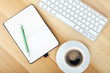 Foto: Office supplies, computed keyboard and coffee cup Office supplies, computed keyboard and coffee cup