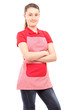 Smiling girl wearing an apron and looking at camera