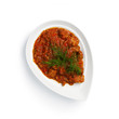 Photo: meat in a sauce on a white plate meat in a sauce on a white plate