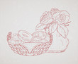 Basket of pastries and a bouquet in a vase.