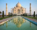A perspective view on Taj Mahal mausoleum with reflection in wat