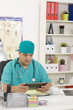 Doctor working on a digital tablet