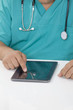Doctor working on a digital tablet