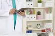 Doctor working on a digital tablet