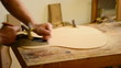 Luthier  working  in  a  guitar