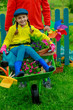 Gardening, planting - girl helping father in the garden