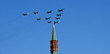 Russian military aircrafts fly in formation over Red Square duri