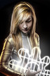 Fiber optics concept, future blonde dressed in silver