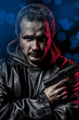 Photo: dangerous secret agent with gun and police emergency lights dangerous secret agent with gun and police emergency lights