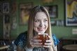 Photo: Blonde Woman with Beautiful Blue Eyes Drinks a Goblet of Beer Blonde Woman with Beautiful Blue Eyes Drinks a Goblet of Beer