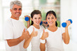 healthy family giving thumbs up