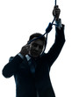 Foto: man holding adjusting hangman noose silhouette man holding adjusting hangman noose silhouette