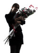 Photo: business woman hugging flowers bouquet silhouette business woman hugging flowers bouquet silhouette