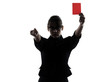 business woman showing red card silhouette