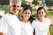 happy family in sportswear at the beach
