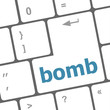 dangerous bomb button on white computer keyboard