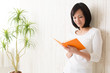 beautiful asian woman reading book