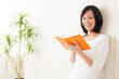 beautiful asian woman reading book