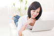 beautiful asian woman using laptop computer