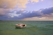 Photo: woman in bed adrift woman in bed adrift