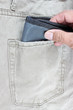 wallet in jeans pocket