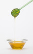 full honey pot and honey stick
