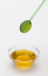 full honey pot and honey stick