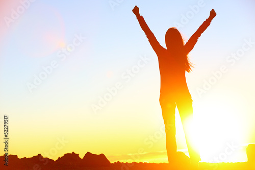 Photo: Happy celebrating winning success woman sunset Happy celebrating winning success woman sunset
