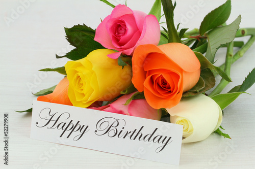 Photo: Happy Birthday note and colorful bouquet of roses Happy Birthday note and colorful bouquet of roses