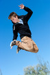 Energetic boy jumping.