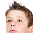 Photo: Macro portrait of Boy looking at corner. Macro portrait of Boy looking at corner.