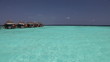 Island in ocean, overwater villas