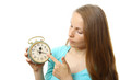 Photo: woman with alarm clock, isolated on white woman with alarm clock, isolated on white