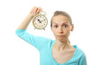 woman with alarm clock, isolated on white