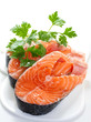 Slices of salmon, isolated on a white background.