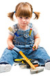 bambina con attrezzi da lavoro