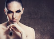 Adult pretty woman stylish portrait. Skin texture saved