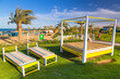 Sunbeds on the beach of tropical resort in Hurghada, Egypt