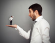 amazed boss with small man
