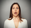 frightened woman looking at camera