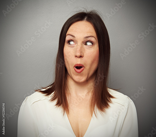 Photo: amazed woman looking at something amazed woman looking at something
