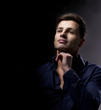 Elegant young handsome man. Studio fashion portrait.
